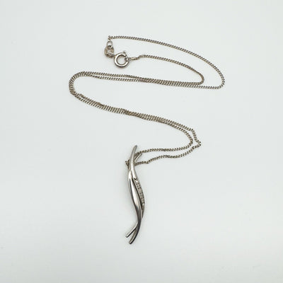 Sterling silver chain with Hot Diamonds pendant laid flat