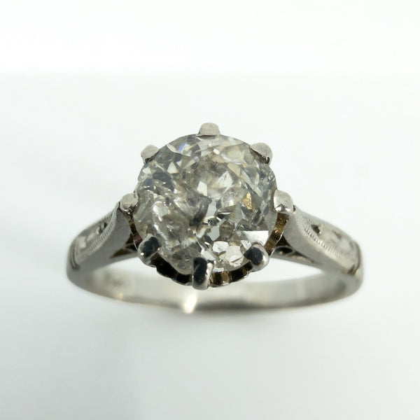 Detailed view of old-cut diamond in antique platinum eight-claw solitaire ring setting