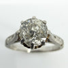 Close up of antique old-cut diamond in eight-claw platinum solitaire ring setting