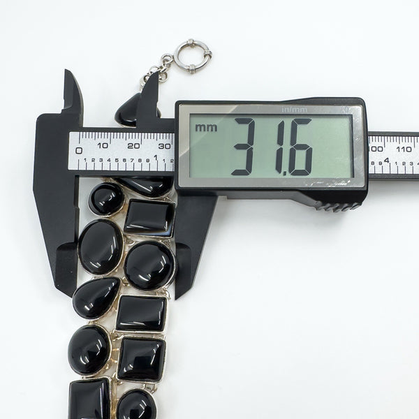 Chunky black onyx bracelet measured at approximately 31.6mm wide with digital callipers