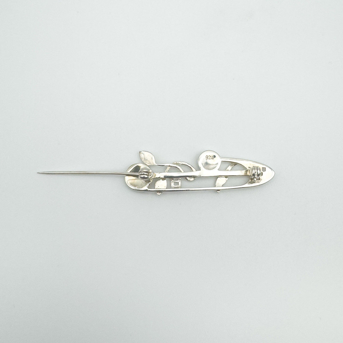 Open rolling clasp on sterling silver Celtic brooch stamped 925
