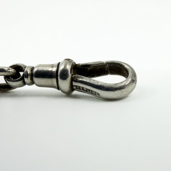 Close up of open dog clip on antique Victorian sterling silver Albert chain