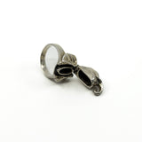 Open sterling silver elephant locket ring showing the small hidden compartment inside