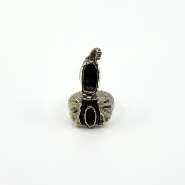 Open sterling silver elephant locket ring showing the small secret compartment inside the head