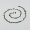 Vintage sterling silver open heart link necklace laid flat, showing the full chain design