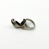Open vintage sterling silver elephant ring showing the hinged locket compartment and 925 stamp inside band