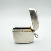 Open vesta case with visible inner gold wash and hallmark detail