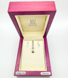 Matching sterling silver diamond necklace and earrings set in eNVy gift box