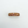 Top-down view of ruby pavé band showing three neat rows of natural rubies