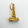 Top view of vintage 9ct gold tower pendant showing textured detail