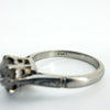 Close up of PLAT stamp inside antique platinum old-cut diamond solitaire ring
