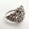 Close-up showing S925 ALE 58 hallmark on Pandora floral ring