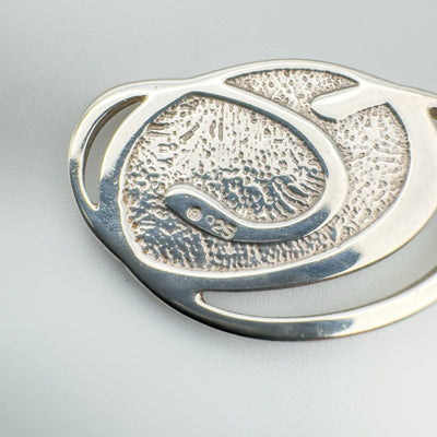Close-up of 925 stamp on back of sterling silver enamel pendant