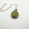 Close-up of oval Connemara marble pendant surrounded by marcasites in sterling silver