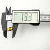 Digital caliper showing sea shell pendant measures 13.3mm
