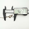 Pendant measured with digital caliper showing length in millimetres