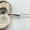 Close-up of 925 and G hallmark on sterling silver pendant