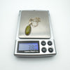 Digital scale showing total weight of Connemara and marcasite pendant necklace as 3.8 grams