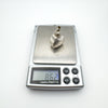 Vintage sterling silver perfume bottle pendant weighing 8.62g on digital scale