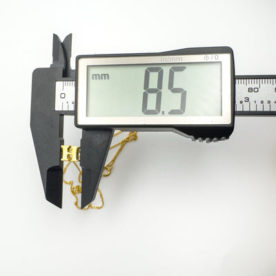 Vermeil H pendant width measuring 8.5mm with digital calipers