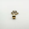 Flat lay of rose cut diamond pendant in antique platinum and gold