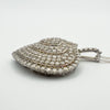 Dimensional side angle of large diamond pavé heart necklace