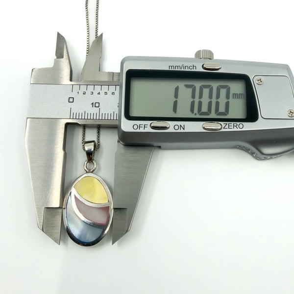 Sterling silver oval pendant necklace with blue, pink and yellow inlay, shown measuring 17.00mm on calipers.