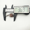 Measuring chunky vintage silver fob pendant at 36.9mm in length