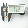 Digital caliper measuring the width of the antique anchor pendant at 17.2mm