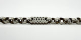 Close up of a pierced star and bar link on an antique Victorian sterling silver Albert chain