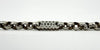 Close up of a pierced star and bar link on an antique Victorian sterling silver Albert chain
