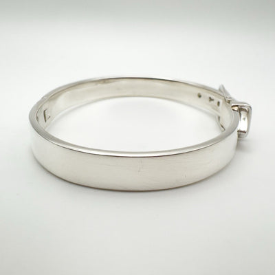 Plain rear view of silver bangle showing smooth polished surface