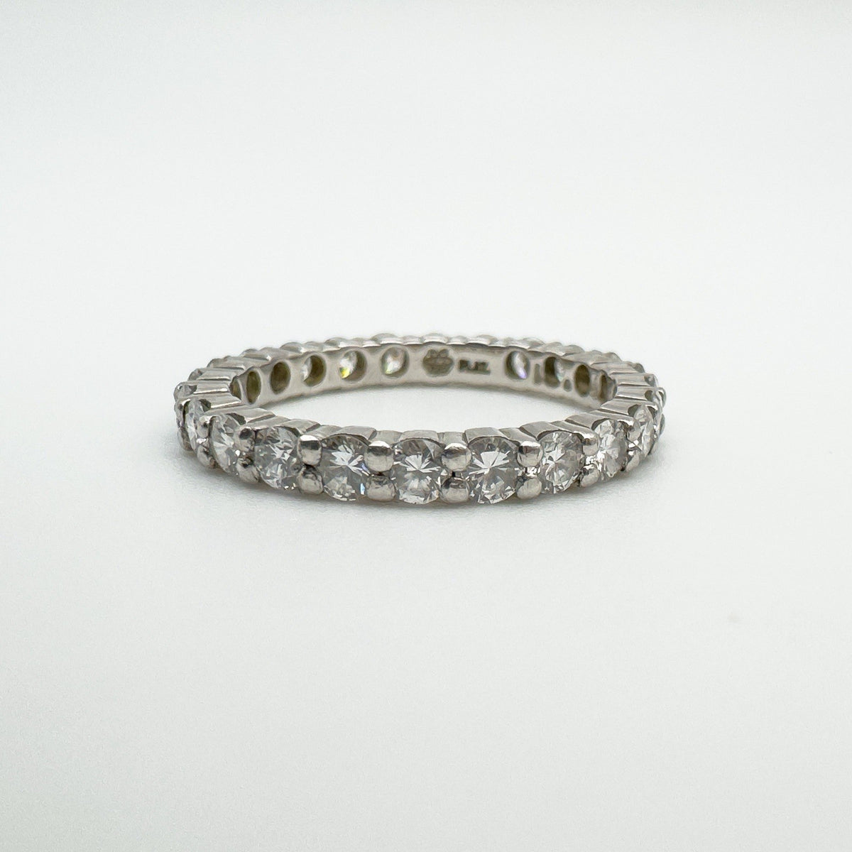 Platinum full eternity ring with natural diamonds, front view