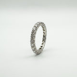 Platinum diamond full eternity ring shown upright to display side profile