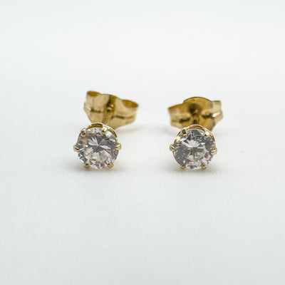 Preloved 9ct gold CZ stud earrings with round cut stones and butterfly backs