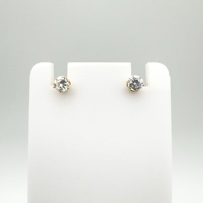 Preloved 9ct gold CZ stud earrings with round cut stones and butterfly backs front