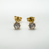 Preloved 9ct gold CZ stud earrings with round cut stones and butterfly backs front