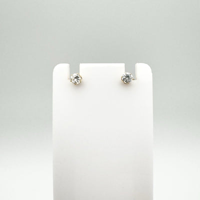 Preloved 9ct gold CZ stud earrings with round cut stones and butterfly backs