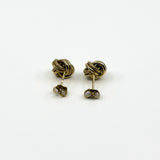Back view of vintage 9ct gold knot stud earrings with butterfly backs