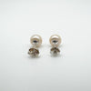 Back of pearl stud earrings with butterfly backs visible