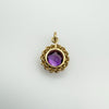 Reverse side of pendant showing amethyst through open back and twisted gold detail