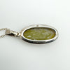 Back of Connemara pendant showing "STERLING" mark on oval silver frame