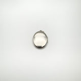 Back of vintage sterling silver locket with smooth polished surface