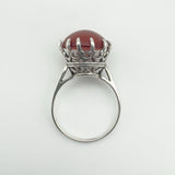 Right side of vintage silver ring with cabochon carnelian gem