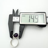 Measurement of ring head showing 14.9mm width on sterling silver modernist setting