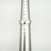 Sterling silver matte band ring shown on ring sizer at size N–O