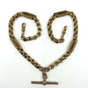 Antique 9ct rose gold Albert chain with fancy links, two dog clips and T bar laid in a heart shape