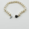 New freshwater pearl bracelet showing rose shaped push clasp and chunky hand knotted baroque pearls