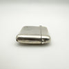 Side profile of antique vesta case showing hinge and curved form