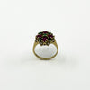 Reverse view of vintage 18ct gold ruby emerald and diamond ring showing the high cluster setting